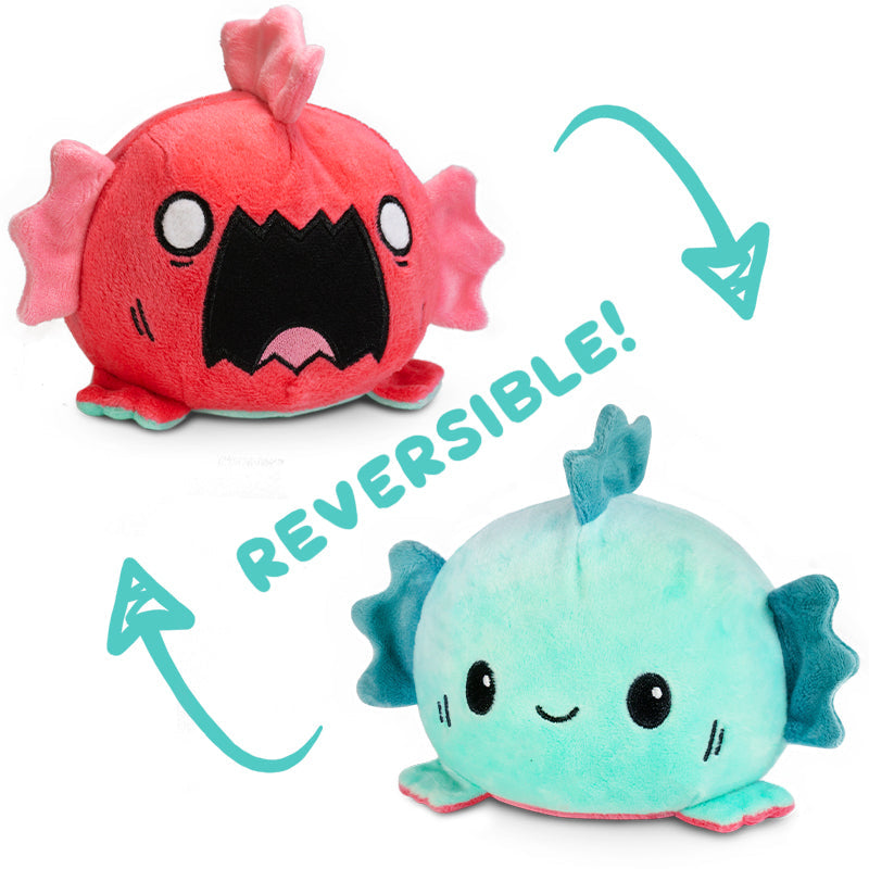 Two TeeTurtle Reversible Sea Monster Plushies that express emotions.