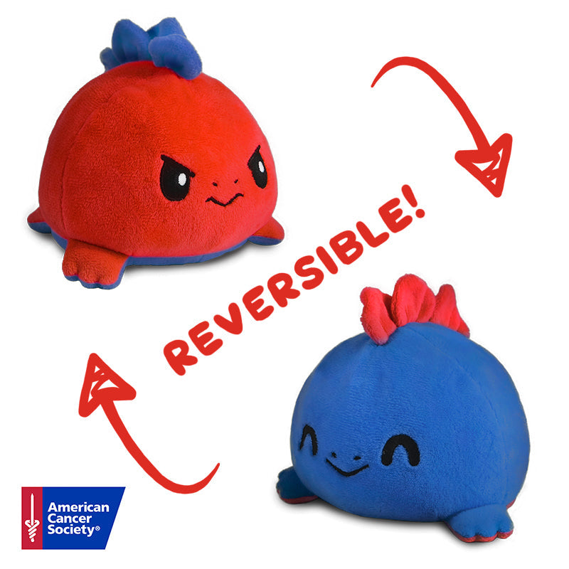 A TeeTurtle Reversible Stego Plushie (Blue & Red) designed to express emotions on the cancer journey.