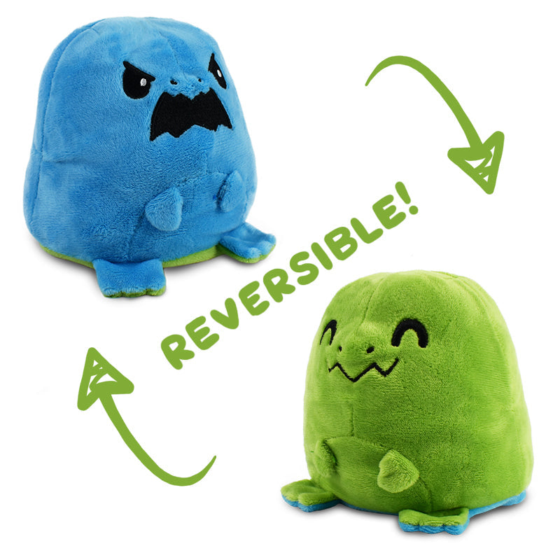 A Reversible T-Rex Plushie by TeeTurtle with a T-rex design.