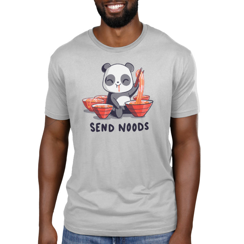 Premium Cotton T-shirt_A cartoon panda joyfully eating noodles with chopsticks, surrounded by bowls of noodles. Text at the bottom reads, "SEND NOODS." Made from super soft ringspun cotton, this unisex Send Noods apparelby monsterdigital is perfect for noodle lovers everywhere.