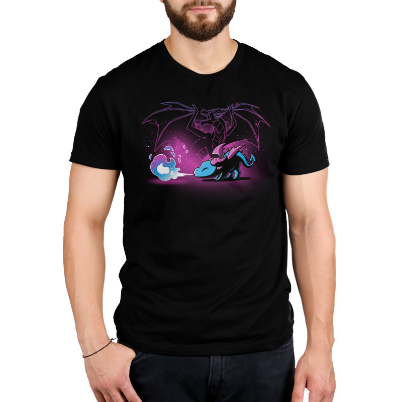 Premium Cotton T-shirt_TeeTurtle Spirit of the Dragon black t-shirt featuring a shiny magical little dragon breathing blue and purple fire with a silhouette of a big fierce dragon behind them.