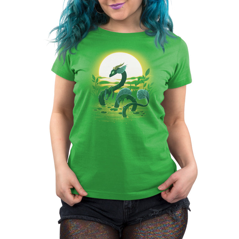 Premium Cotton T-shirt_TeeTurtle Swamp Dragon apple t-shirt featuring a magical dragon coming up out of a swamp covered in greenery with a sun setting in the background.