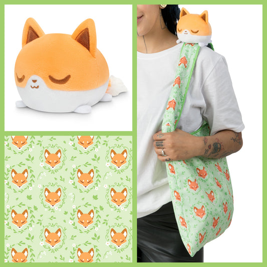 A woman is holding a Floral Fox Plushie Tote Bag from TeeTurtle, with a fox stuffed animal plushie.