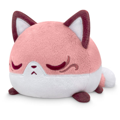 Plushiverse Enchanting Kitsune plushie tote bag designed to look like a sleepy, pink and white cat with closed eyes and a small tail from the TeeTurtle plushies collection.