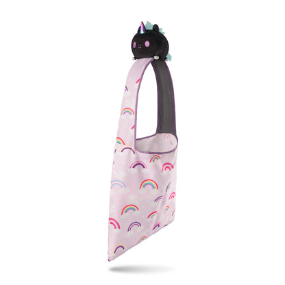 A Pride Rainbows Unicorn Plushie Tote Bag with a unicorn and rainbows on it by TeeTurtle.