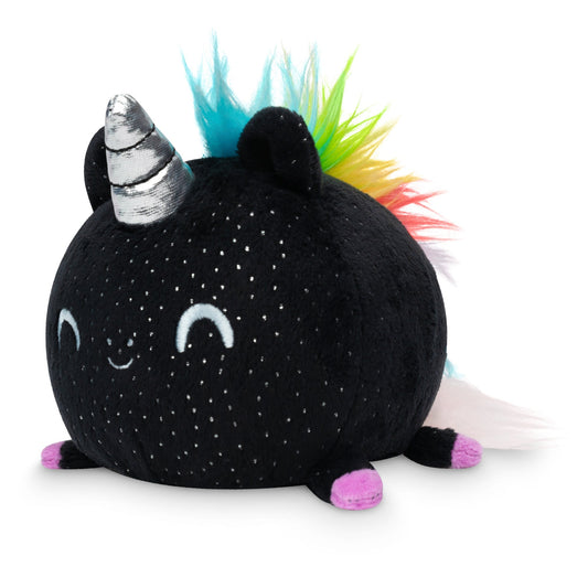 A small black plush toy shaped like a round unicorn with a silver horn, rainbow mane, and pink hooves, the Plushiverse Unicorn Pride Plushie Tote Bag made by TeeTurtle is both adorable and eco-friendly, crafted from recycled plastic bottles.