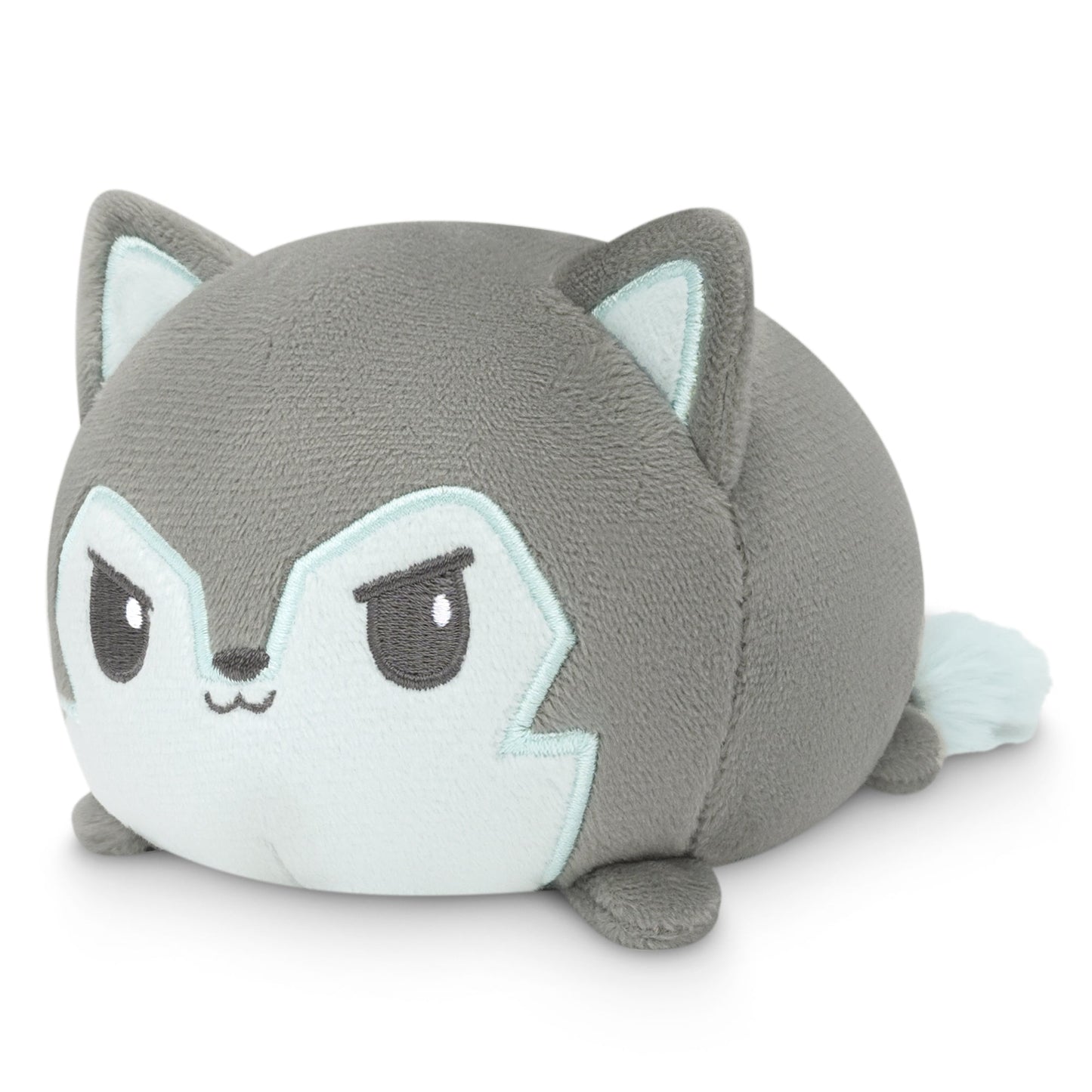 A gray cat stuffed animal with blue eyes, perfect for TeeTurtle's Forest Wolf Plushie Tote Bag collectors.