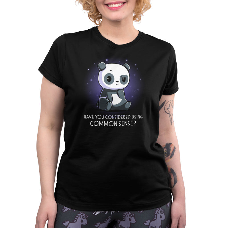 Premium Cotton T-shirt_TeeTurtle Have You Considered Using Common Sense? black t-shirt featuring a panda sitting with a skeptical expression against a starry background. The text at the bottom reads, "Have you considered using common sense?" 