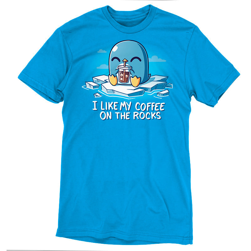 Premium Cotton T-shirt - A cobalt blue apparel featuring a cartoon penguin drinking iced coffee and the text "I like my coffee on the rocks," made from super soft ringspun cotton. Product Name: I Like My Coffee on the Rocks Brand Name: monsterdigital