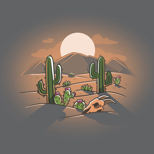 Premium Cotton T-shirt_TeeTurtle  Desert at Dusk charcoal gray t-shirt featuring a cartoon desert scene with cacti, a cow skull, and distant mountains under a stunning desert sunset. 