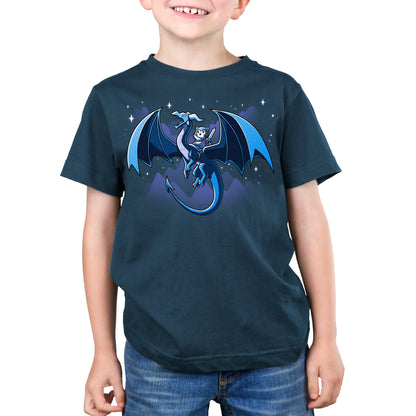 Premium Cotton T-shirt_TeeTurtle Dragon Rider denim blue t-shirt featuring a dragon with large wings flies through a night sky with mountain silhouettes and stars in the background, carrying a person in armor and a hood on its back.