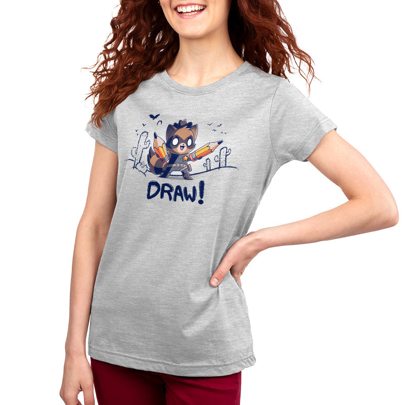 Premium Cotton T-shirt_Teeturtle Draw! silver gray t-shirt featuring a cowboy-attired raccoon in a sketched desert complete with vultures and cacti holding a pair of pencils with 'Draw!' written underneath.