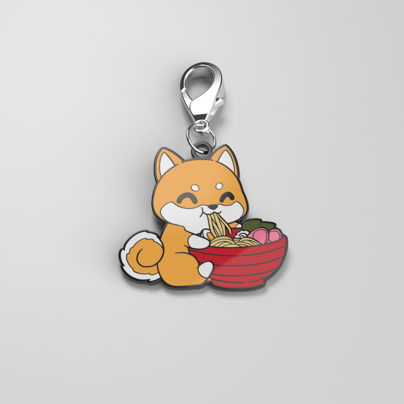 A Ramen Shiba Enamel Keychain by TeeTurtle featuring a dog with food in a bowl, showcasing personal style.