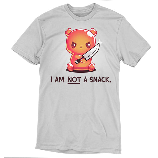 Premium Cotton T-shirt_TeeTurtle I Am Not A Snack silver gray t-shirt featuring a semi-translucent orange gummy bear holding a large kitchen knife looking angry. Beneath it there's text saying 