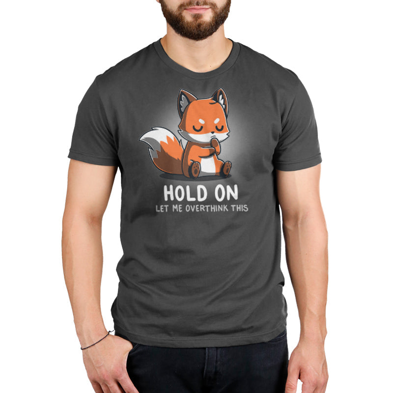 Premium Cotton T-shirt_TeeTurtle Let Me Overthink This charcoal gray t-shirt featuring  a fox sitting with eyes closed and paws together, appearing deep in thought. The text below reads, "hold on, let me overthink this." 