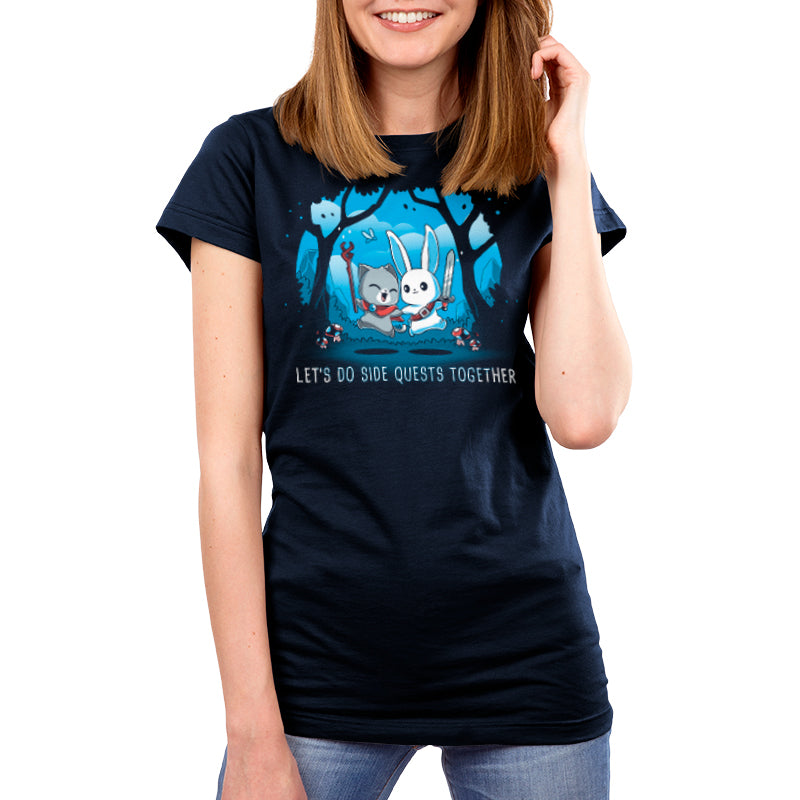 Premium Cotton T-shirt_TeeTurtle Let’s Do Side Quests Together navy blue t-shirt featuring a cat with a staff and a bunny with a sword surrounded by trees and mushrooms.