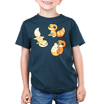 Premium Cotton T-shirt_TeeTurtle Lil Geckos denim blue t-shirt featuring three Lil' Geckos with varying yellow and orange patterns, sitting.