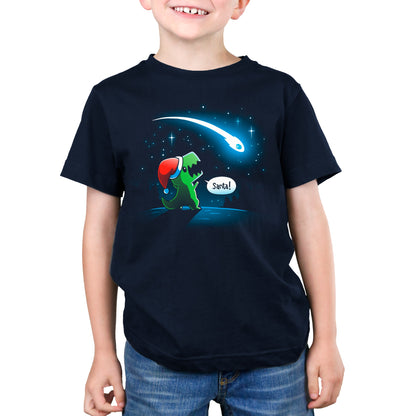 Premium Cotton T-shirt_TeeTurtle Look, Santa! navy blue t-shirt featuring a dinosaur with a Christmas santa hat on looking at a meteor, shouting “Santa!”