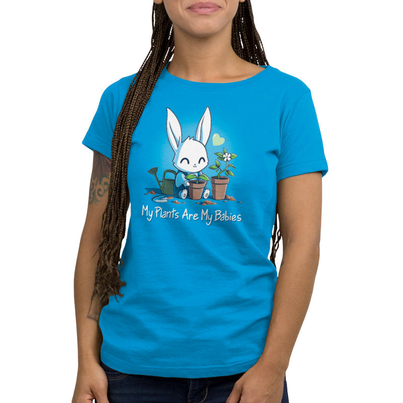 Premium Cotton T-shirt_Teeturtle My Plants Are My Babies cobalt blue t-shirt featuring a smiling bunny watering two potted plants with the phrase "My Plants Are My Babies" written below.