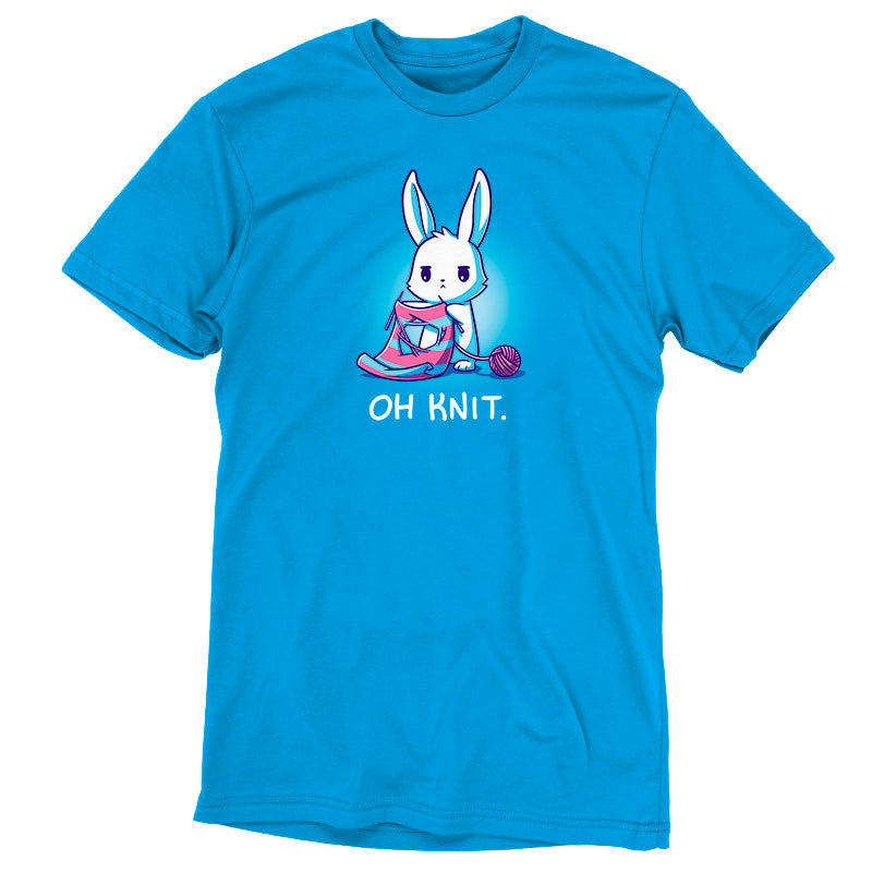 Premium Cotton T-shirt_Teeturtle Oh Knit Cobalt Blue featuring a white rabbit looking distraught. It's holding two knitting needles attached to a blue and pink striped scarf that has a large hole in the middle. There is a ball of pink yarn trailing off to the side and text beneath it that says "Oh knit."