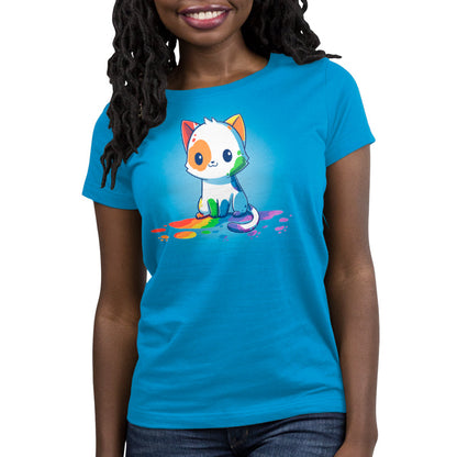 Premium Cotton T-shirt_TeeTurtle Rainbow Cat Cobalt Blue t-shirt featuring an illustration of a white cartoon kitten with colorful paint splashes on its body, sitting on a floor with rainbow-colored paint drops around it. 