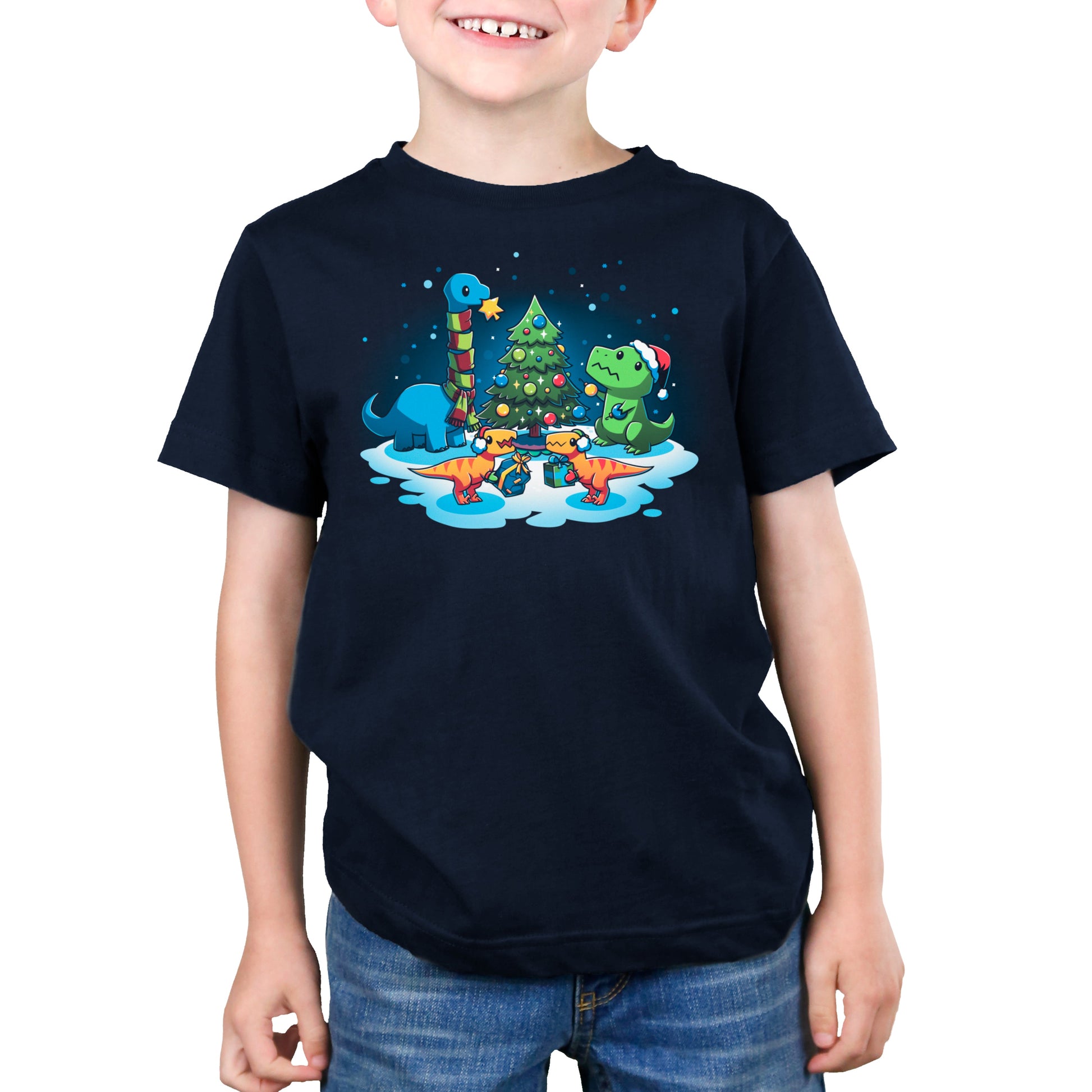 Premium Cotton T-shirt_TeeTurtle A Very Dino Christmas navy blue t-shirt featuring dinosaurs celebrating around a decorated Christmas tree with snow on the ground and dinosaurs holding presents.