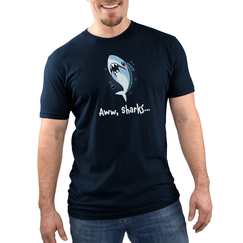 Premium Cotton T-shirt_TeeTurtle Aww, Sharks navy blue t-shirt featuring a cute cartoon shark with a blush on its face that swims with bubbles with a pun at the bottom that says, "Aww, Sharks". 