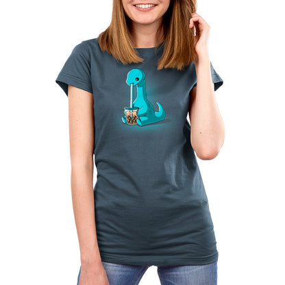 Premium Cotton T-shirt_TeeTurtle Boba Dinosaur Denim t-shirt featuring a cartoon dinosaur sipping bubble tea through a large straw. The dinosaur is blue with a long neck and tail, seated against a dark background. 