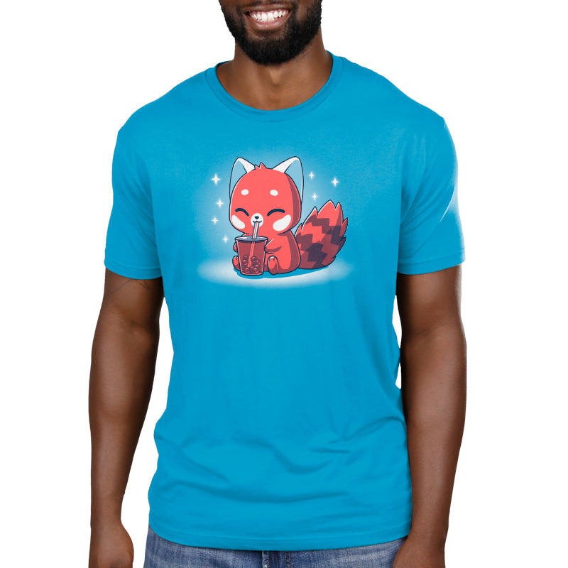 Premium Cotton T-shirt_TeeTurtle Boba Red Panda Cobalt Blue t-shirt featuring a cute red panda cartoon happily drinking bubble tea with a straw against a blue background with sparkles.