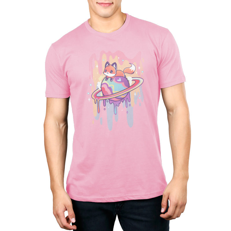 Premium Cotton T-shirt_TeeTurtle Drippy Dreamworld light pink t-shirt featuring a fox sitting on a colorful Saturn-like planet with a dripping effect, set against a pink background with sparkles.