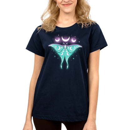 Premium Cotton T-shirt_TeeTurtle Ethereal Moth navy blue t-shirt featuring a celestial moth with moon phases on its wings, glowing against a dark background, surrounded by stars and crescent moons.