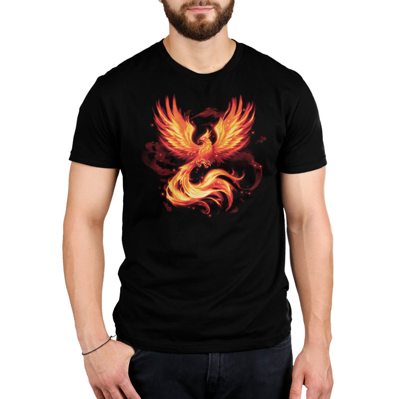 Premium Cotton T-shirt_TeeTurtle Fiery Phoenix black t-shirt featuring a phoenix with outstretched wings, glowing with fiery orange and yellow flames.