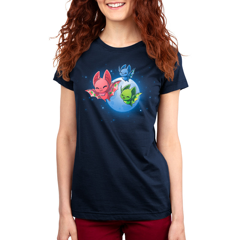 Premium Cotton T-shirt_TeeTurtle Fruit Bats navy blue t-shirt featuring three colorful fruit bats (red, green, blue) with decorative wings flying against a night sky with a full moon and stars.