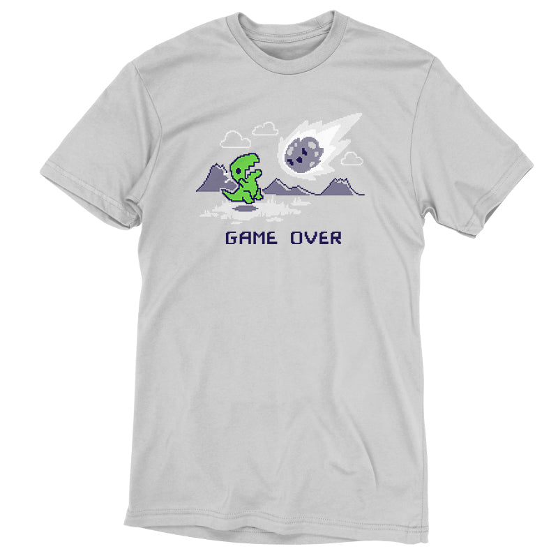 Premium Cotton T-shirt_TeeTurtle Game Over Dinosaur Silver t-shirt featuring Pixel art of a green dinosaur looking at a falling meteor, with mountains in the background