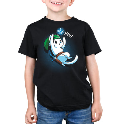  Premium Cotton T-shirt_A cartoon white cat dressed as a warrior with a green hat, holding a sword, looks up on this black monsterdigital apparel. An animated creature above its head says "Hey!" in this super soft ringspun cotton tee.