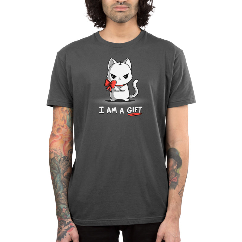 Premium Cotton T-shirt_Teeturtle I Am a Gift charcoal gray t-shirt featuring an annoyed white cat with a red bow around its neck. The text below reads "I AM A GIFT."