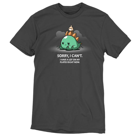 Premium Cotton T-shirt_TeeTurtle I Have A Lot On My Plates charcoal gray t-shirt featuring a grumpy stegosaurus dinosaur lying on the ground with a cute bird on its plates with a pun underneath.