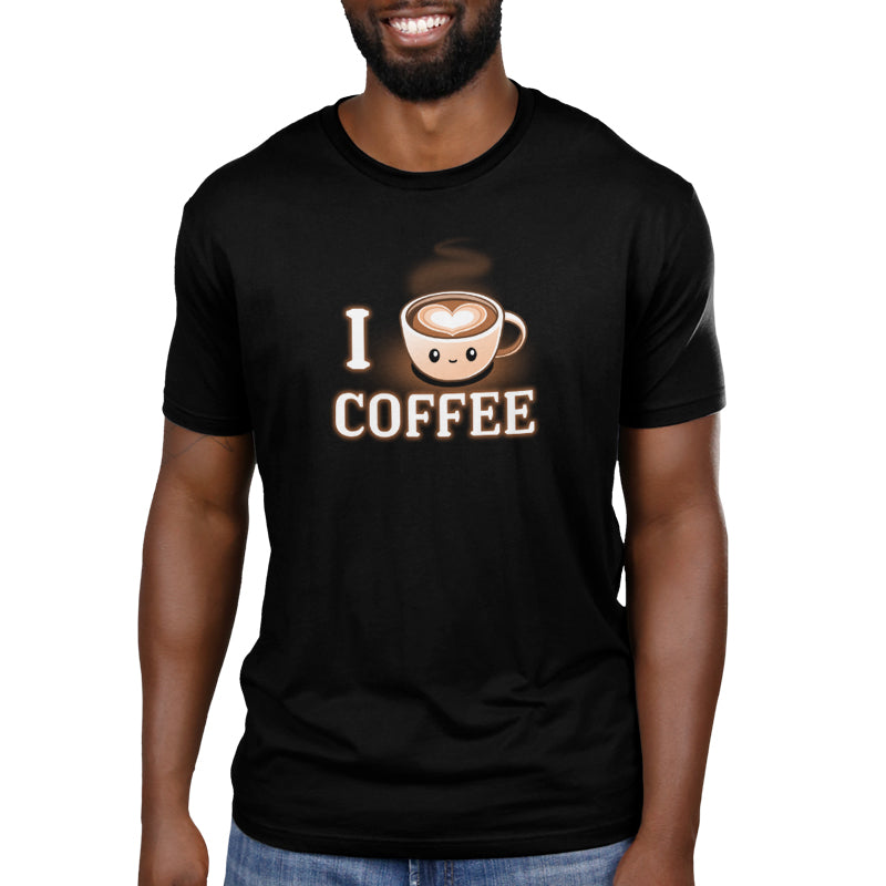 Premium Cotton T-shirt_TeeTurtle I <3 Coffee black t-shirt featuring a coffee cup with a smiling face and a heart-shaped design in the foam, accompanied by the text "I <3 Coffee."