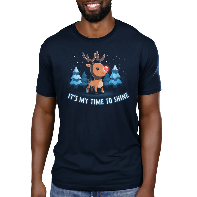 Premium Cotton T-shirt_TeeTurtle navy blue It's My Time To Shine. Featuring a reindeer with a red nose in a wintery forest.