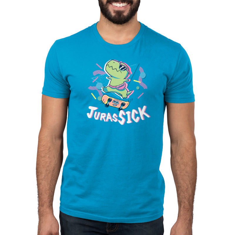 Premium Cotton T-shirt_TeeTurtle JurasSICK cobalt blue t-shirt featuring a cool dinosaur wearing sunglasses and a fanny pack, jumping on a skateboard. The word "JurasSICK" is written at the bottom.