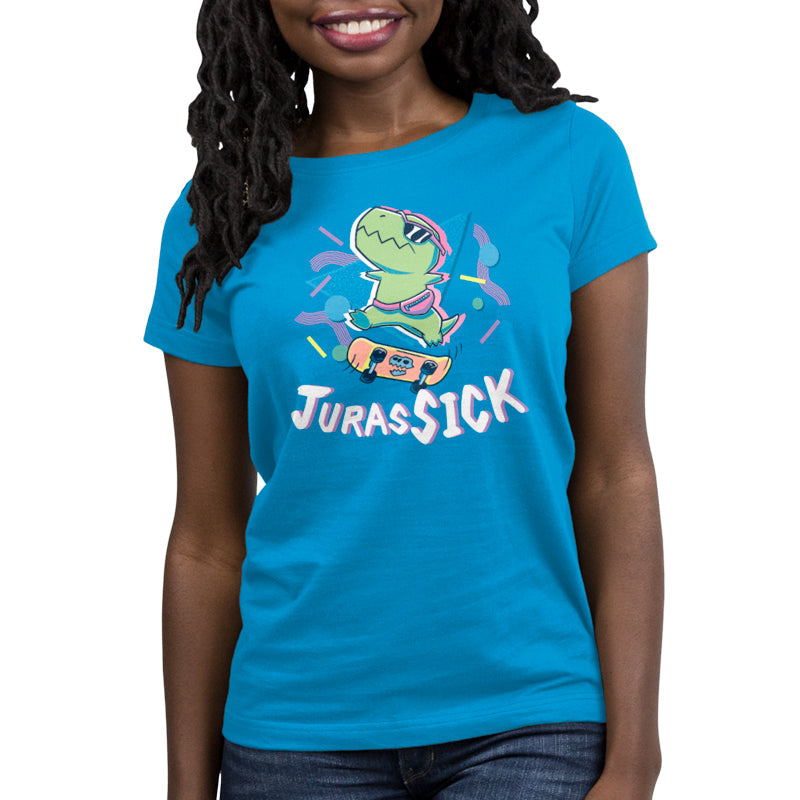 Premium Cotton T-shirt_TeeTurtle JurasSICK cobalt blue t-shirt featuring a cool dinosaur wearing sunglasses and a fanny pack, jumping on a skateboard. The word "JurasSICK" is written at the bottom.