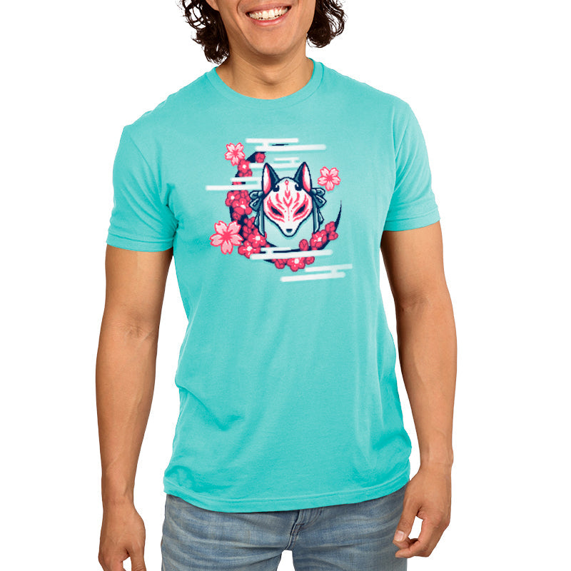 Premium Cotton T-shirt_TeeTurtle Kitsune Mask Pixel Art Caribbean blue t-shirt depicts a pixel art of a white fox mask with red markings and tied bows by a crescent of pink cherry blossoms and stylized white smoke.