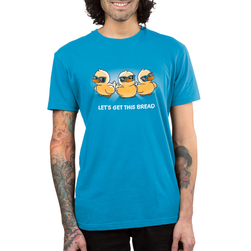 Premium Cotton T-shirt_TeeTurtle Lets Get This Bread Cobalt blue T-shirt featuring Three cartoon ducklings wearing sunglasses.