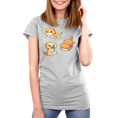 Premium Cotton T-shirt_TeeTurtle Lil Bearded Dragons Silver Gray t-shirt featuring three cartoon-style illustrations of Lil' Bearded Dragons in various poses: sitting and holding food, laying down, and standing on all fours with a happy expression.