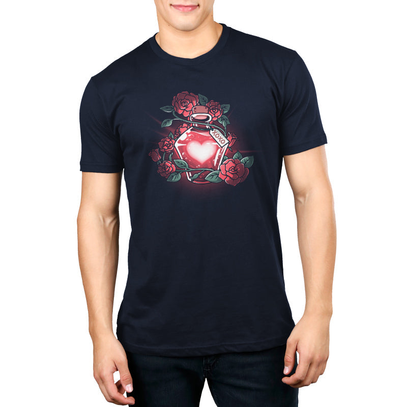 Premium Cotton T-shirt_TeeTurtle Love Potion navy blue t-shirt featuring a glowing red heart-shaped potion bottle surrounded by roses and vines. A tag with "XOXO" hangs from the bottle.