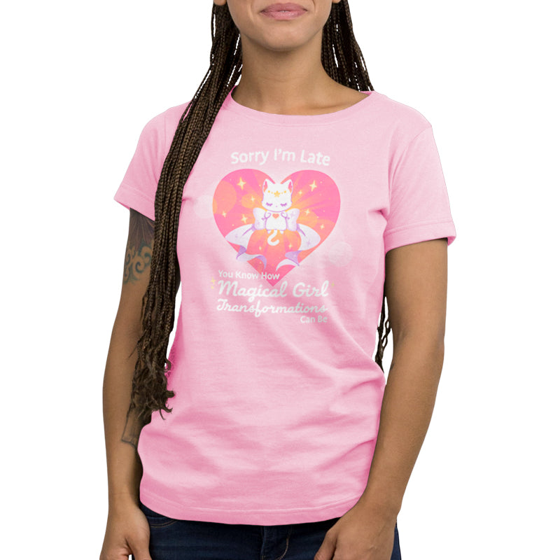 Premium Cotton T-shirt_TeeTurtle light pink Magical Girl Transformations t-shirt featuring a cat transforming into a magical cat like a classic anime magical girl.