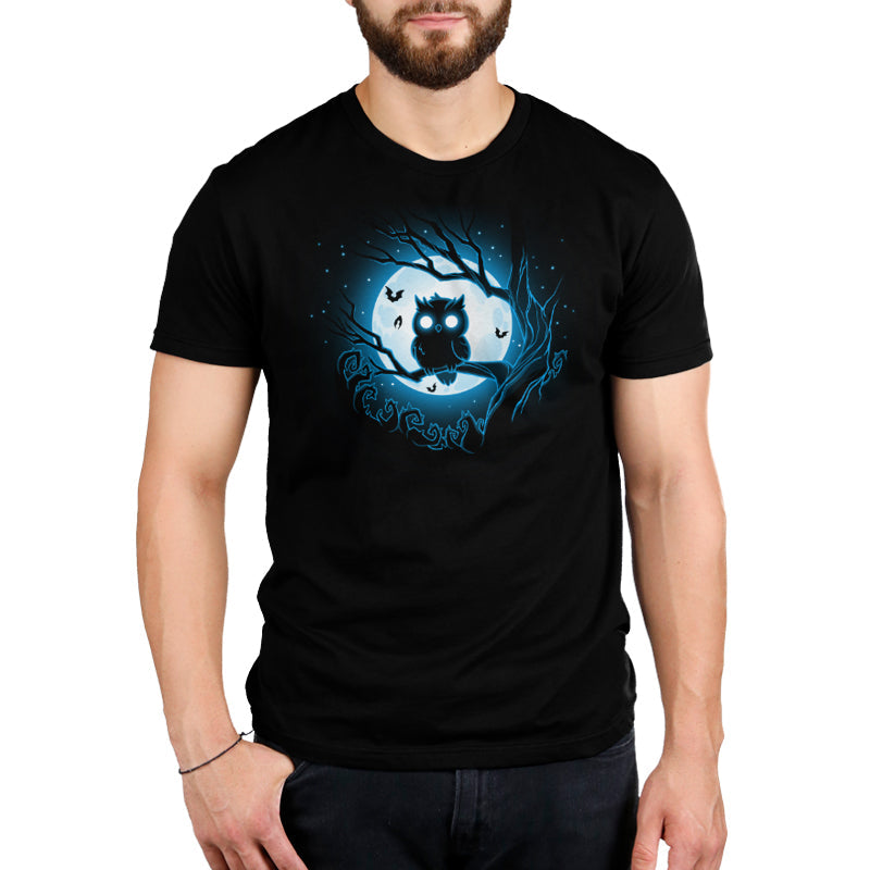 Premium Cotton T-shirt_TeeTurtle Moonlit Owl black t-shirt featuring a glowing blue owl perched on a branch with a full moon and bats in the background.