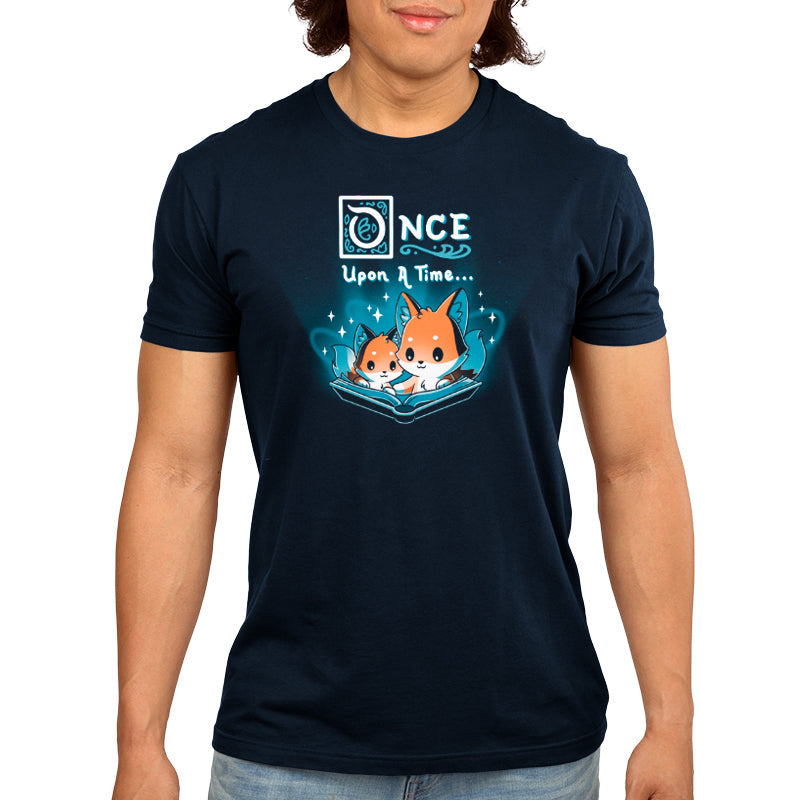 Premium Cotton T-shirt_TeeTurtle Once Upon a Time (Foxes) navy blue t-shirt featuring two cartoon foxes reading a magical open book with the words "Once Upon a Time" above them.