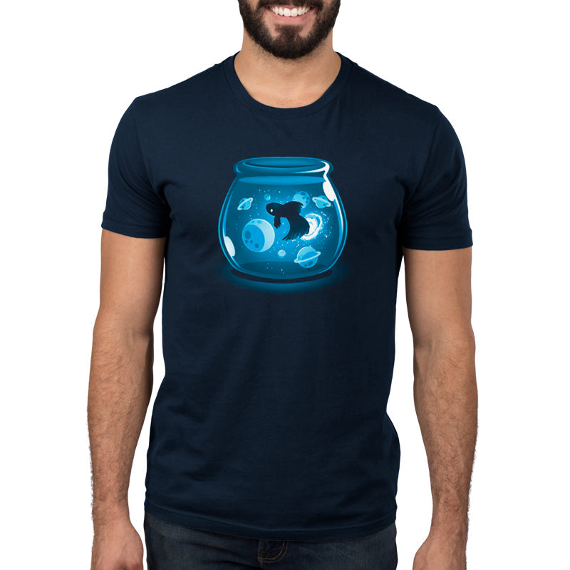 Premium Cotton T-shirt_TeeTurtle Space Betta navy blue t-shirt featuring a glowing fish swimming among planets and stars inside a fishbowl.