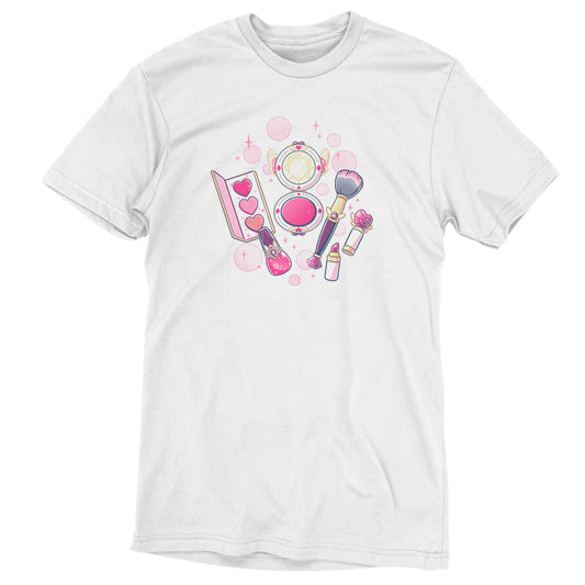 Premium Cotton T-shirt_TeeTurtle Pretty in Pink white t-shirt featuring an illustrated mini makeup set featuring a blush brush, compact mirror, eyeshadow palette, lipstick, and nail polish, all surrounded by decorative pink sparkles and hearts in a magical set. 